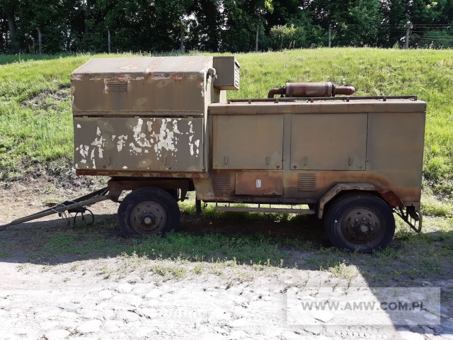 Polowa stacja zasilania PAD 100-3/400/P2 (100 kW, 400 V, 50 Hz) na p-pie 2 os. (ciężar własny 3 800 kg, urwane mocowanie tylnej osi) 